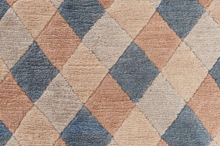 4' 7 x 6' 4 Hand Knotted Tibet Wool Rug