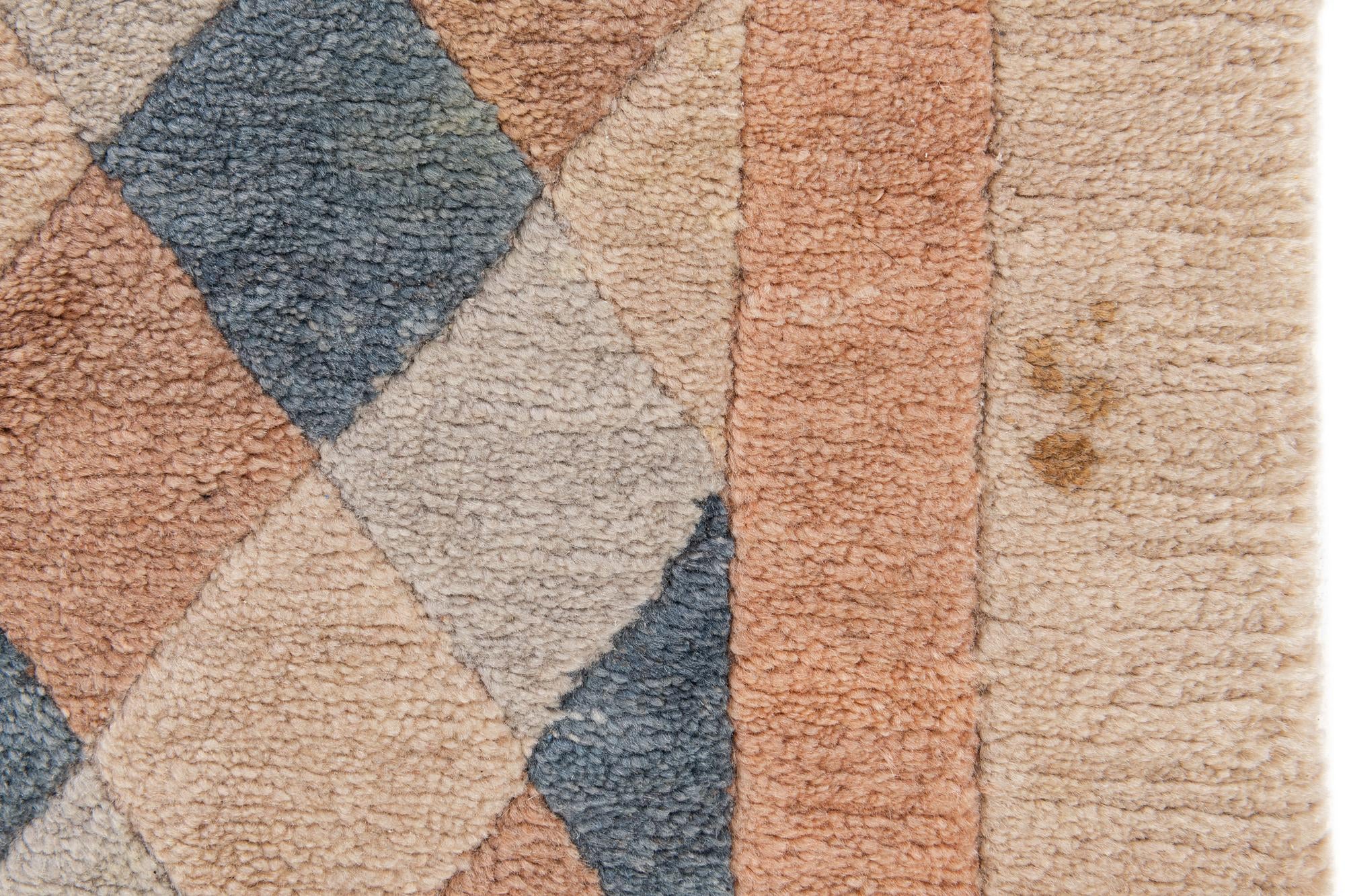 4' 7 x 6' 4 Hand Knotted Tibet Wool Rug
