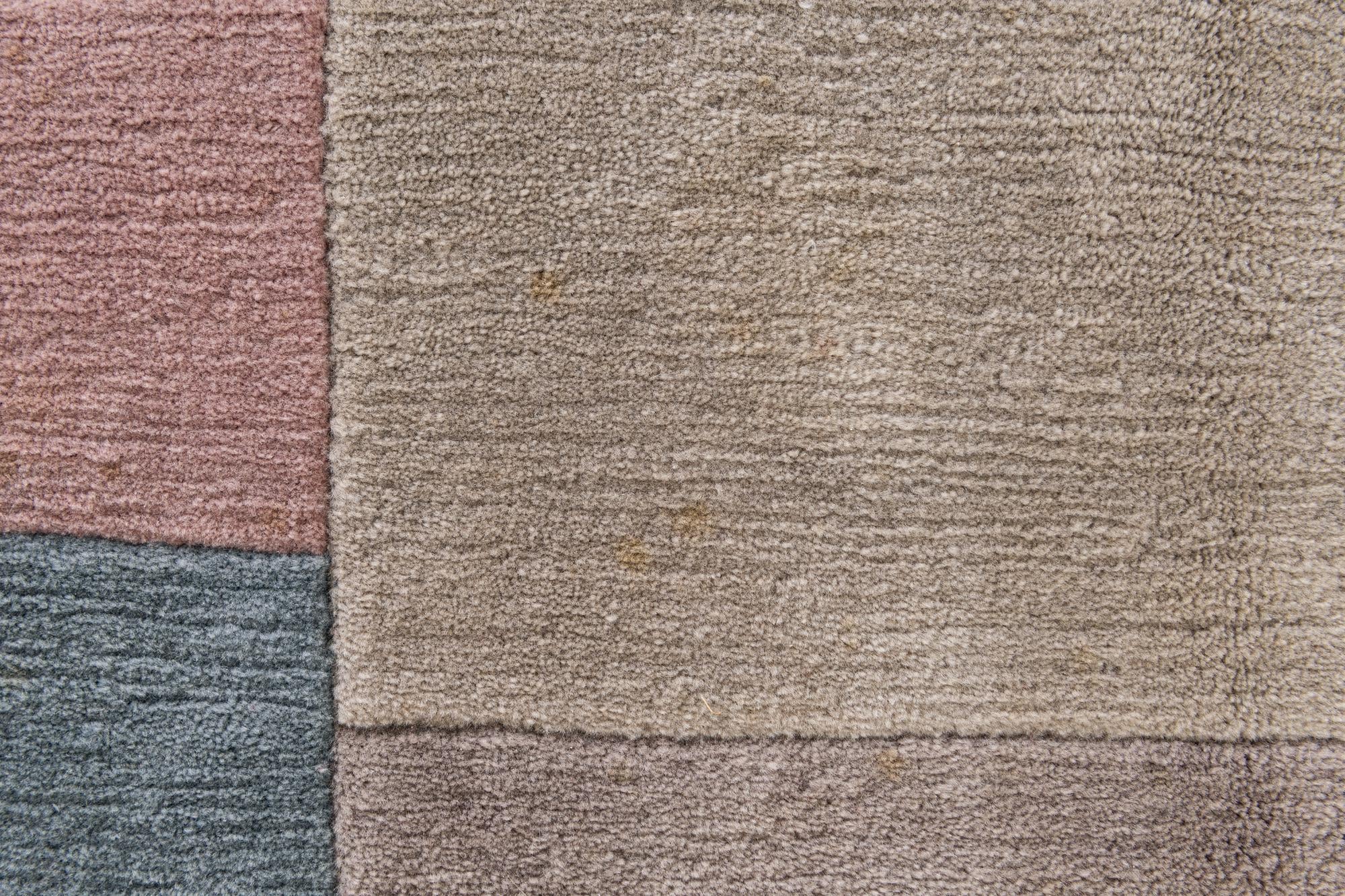 6' 7 x 8' 4 Hand Knotted Tibet Wool Rug