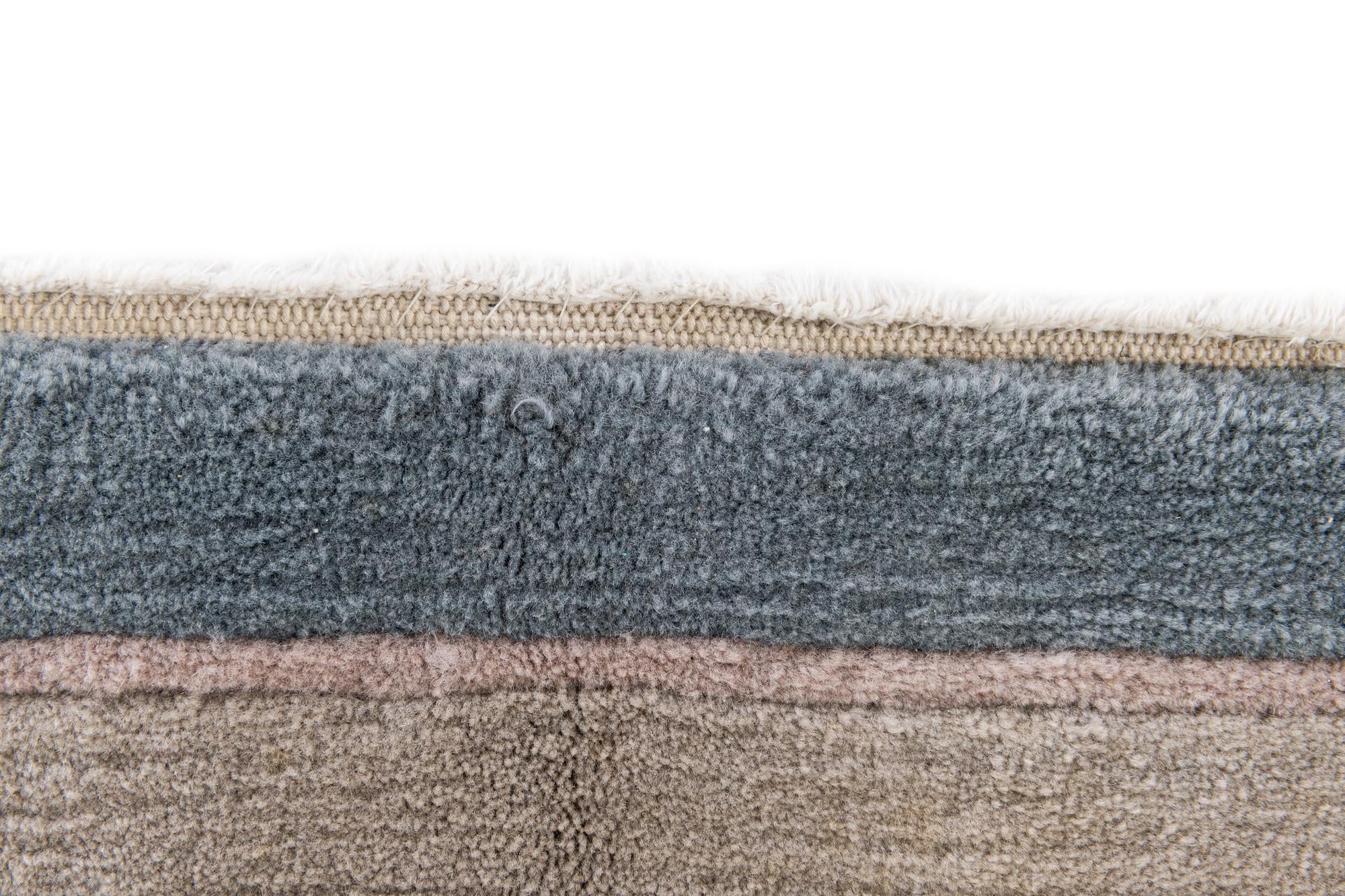 6' 7 x 8' 4 Hand Knotted Tibet Wool Rug