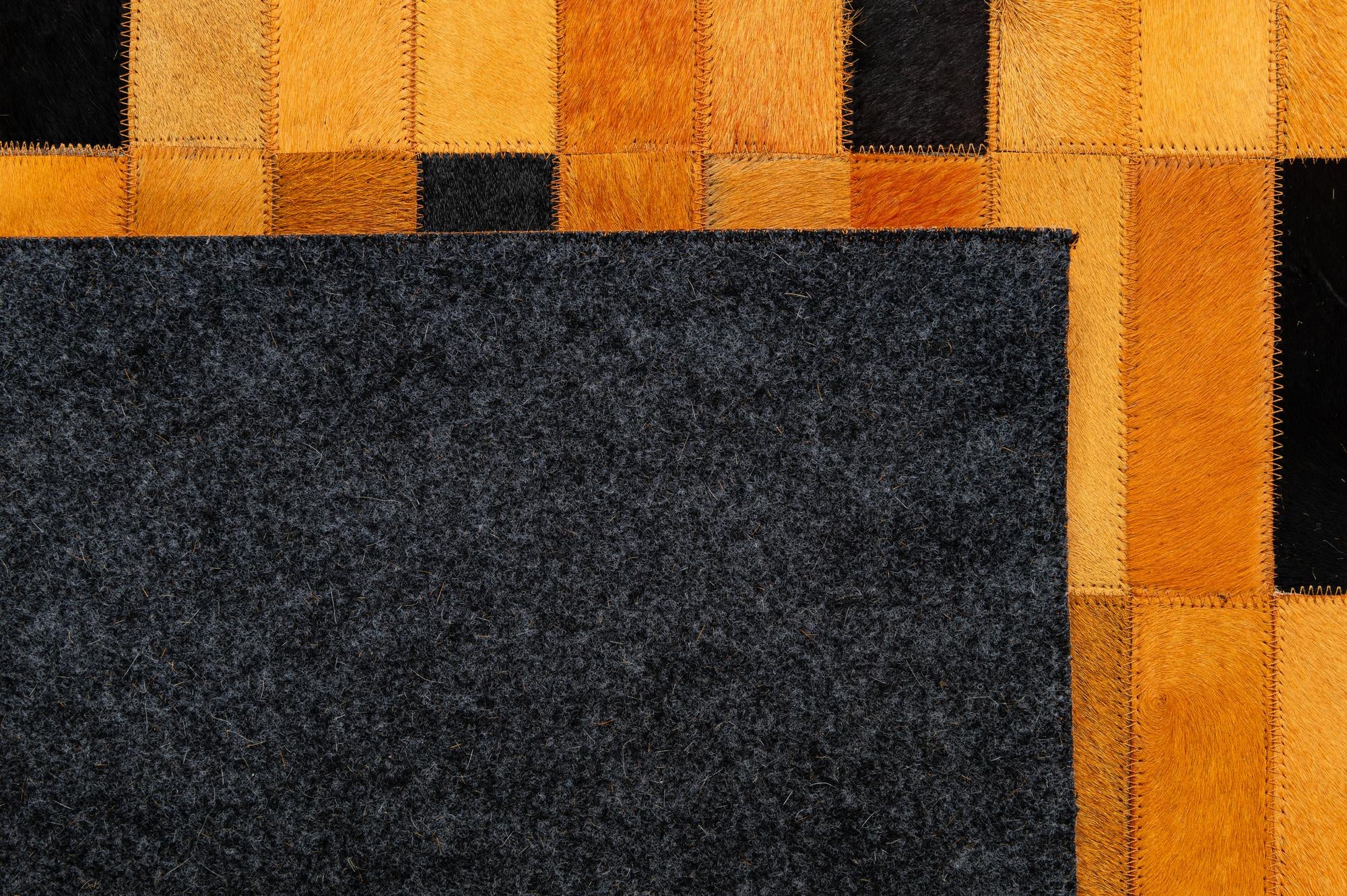 4' 11 x 8' Cowhide - Patchwork Rug