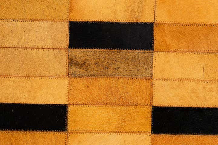 4' 11 x 8' 1 Cowhide - Patchwork Rug