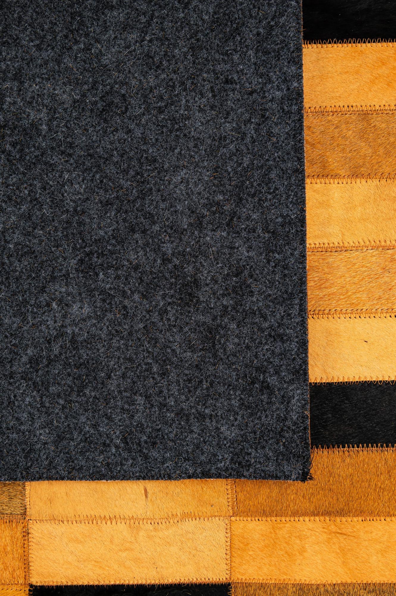 4' 11 x 8' 1 Cowhide - Patchwork Rug