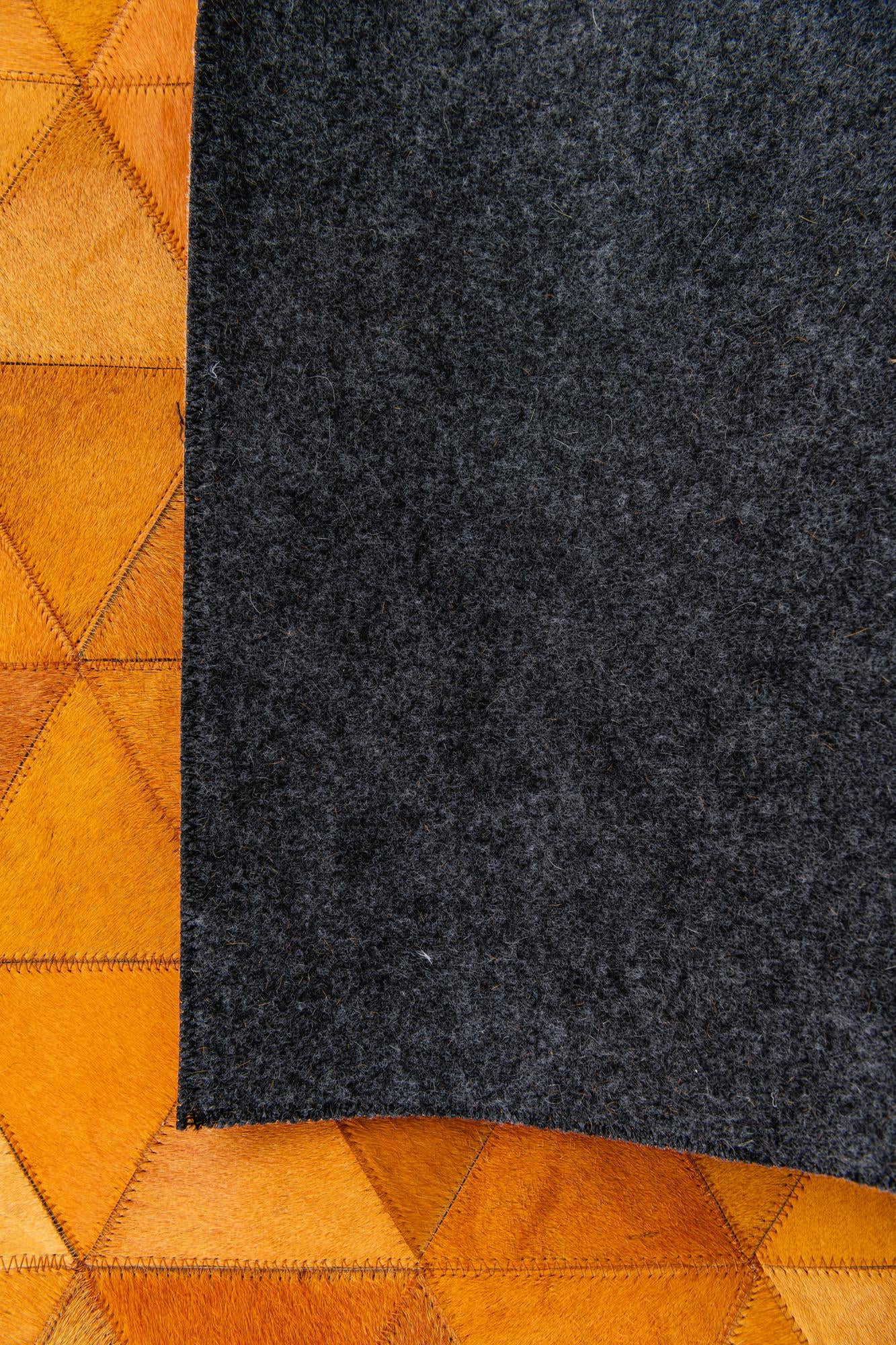 5' 2 x 8' 1 Cowhide Stocks Rug