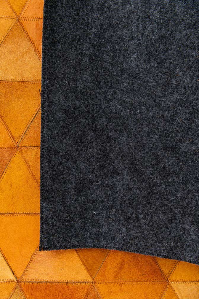 5' 2 x 8' 1 Cowhide Stocks Rug