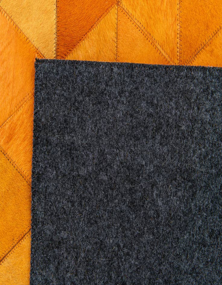 Detail image of 5' 1 x 8' 1 Cowhide Stocks Rug