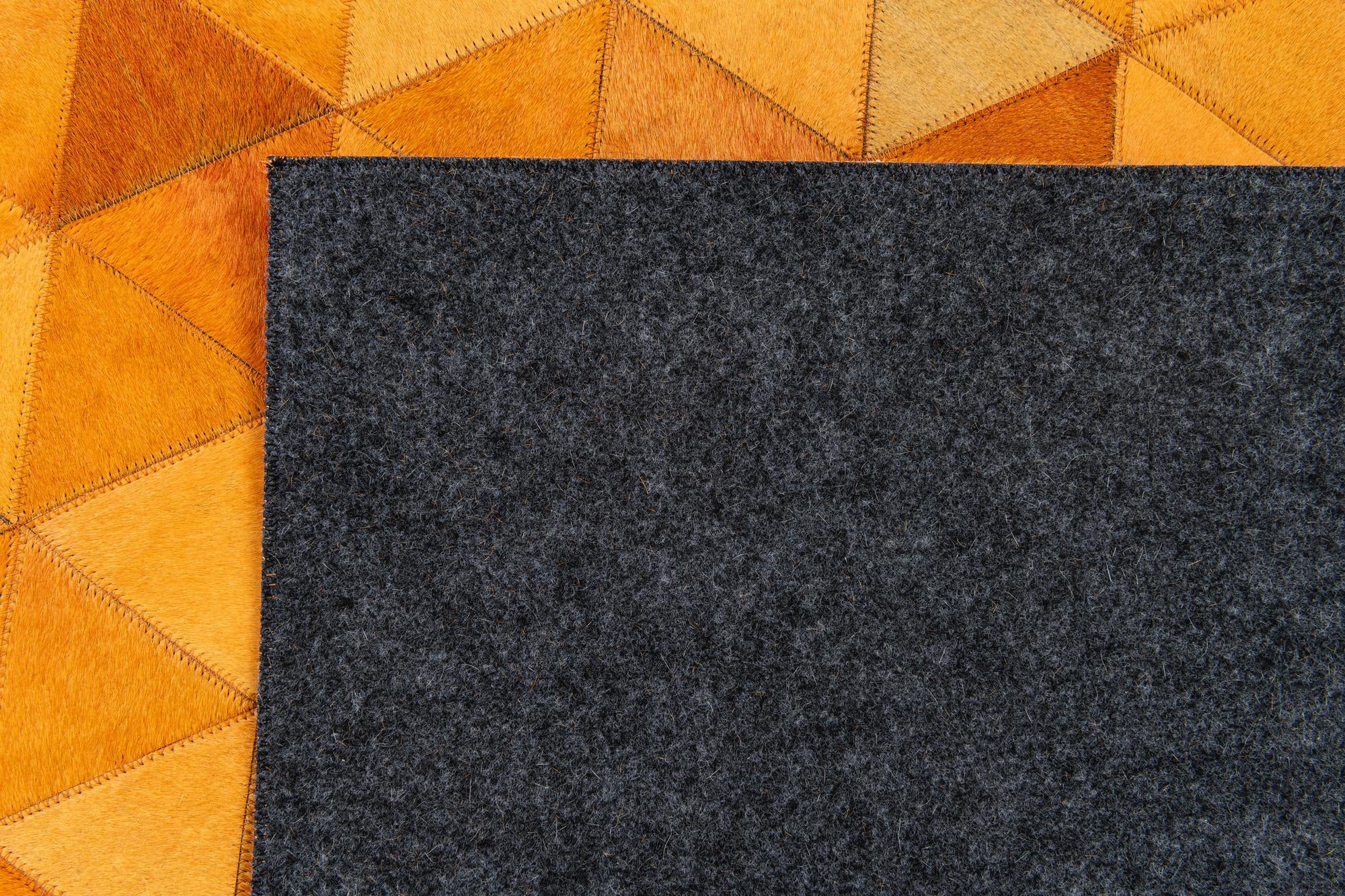 5' 2 x 8' 1 Cowhide Stocks Rug