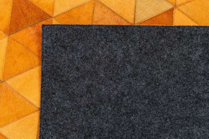 5' 2 x 8' 1 Cowhide Stocks Rug