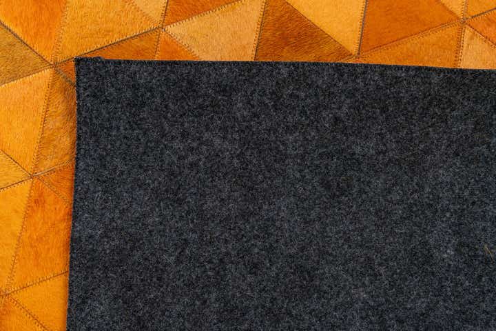 5' 2 x 8' 1 Cowhide Stocks Rug