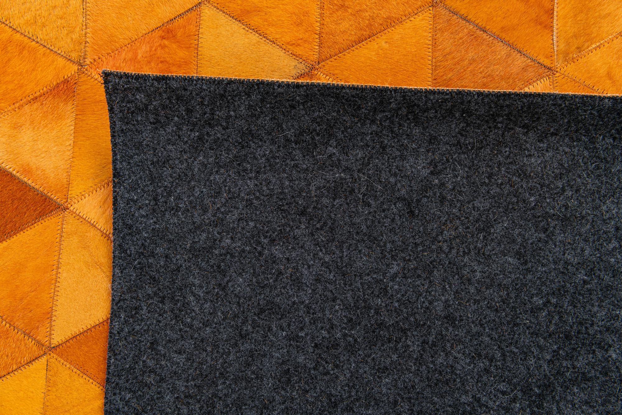 5' 2 x 8' 1 Cowhide Stocks Rug