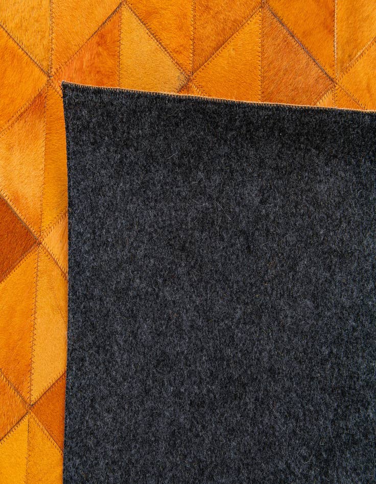 Detail image of 5' 2 x 8' 1 Cowhide Stocks Rug