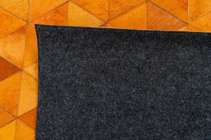 5' 2 x 8' 1 Cowhide Stocks Rug