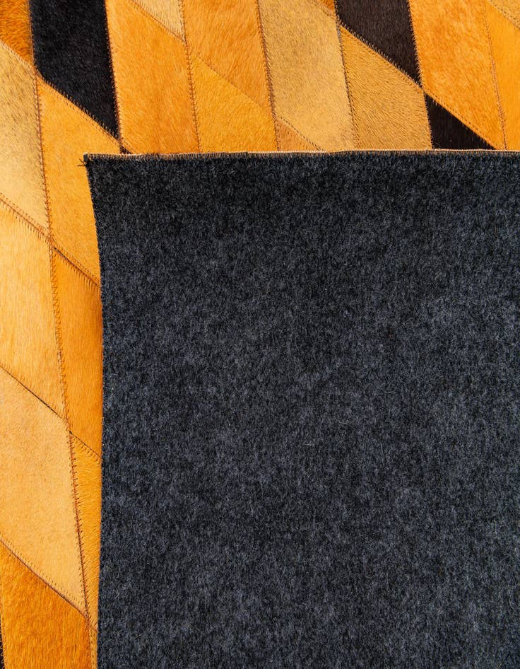 Detail image of 5' 1 x 8' 1 Cowhide Stocks Rug