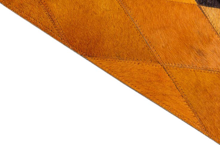 Detail image of 5' 1 x 8' 1 Cowhide Stocks Rug