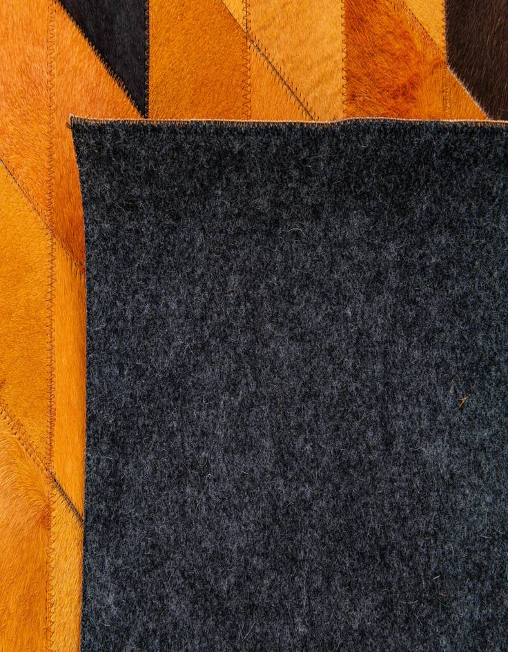 Detail image of 5' 1 x 8' 1 Cowhide Stocks Rug