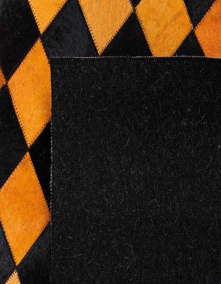 Detail image of 5' x 7' 11 Cowhide Stocks Rug