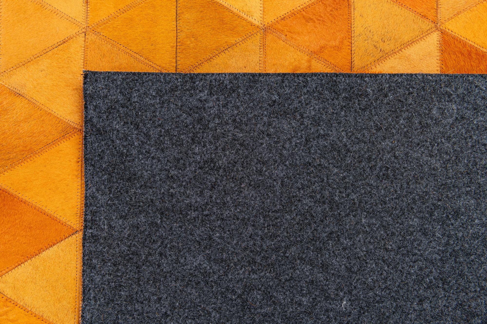 5' 2 x 8' 1 Cowhide Stocks Rug