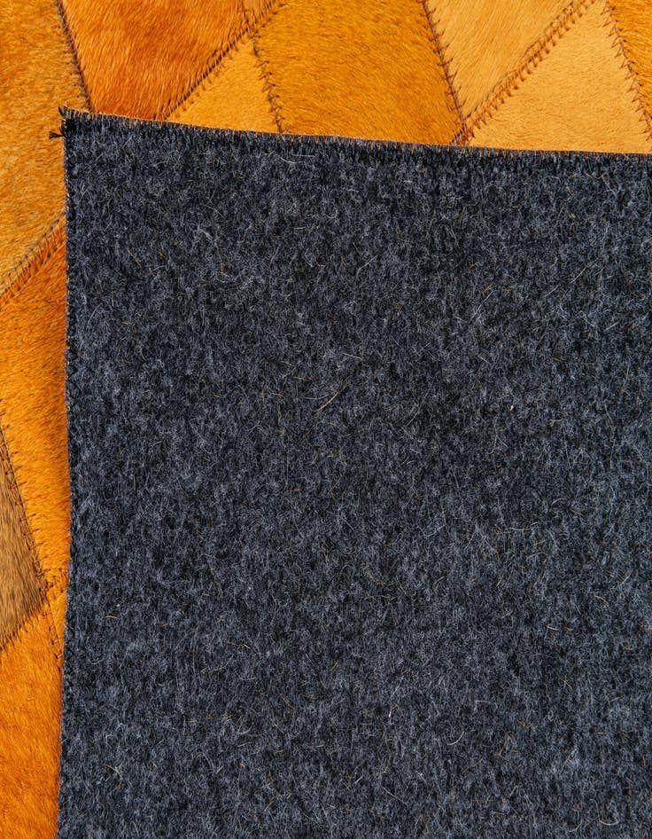 Detail image of 5' 3 x 8' 2 Cowhide Stocks Rug