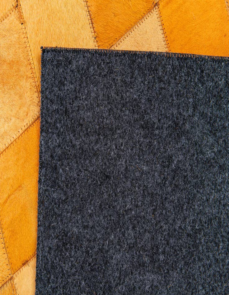 Detail image of 5' 2 x 8' Cowhide Stocks Rug