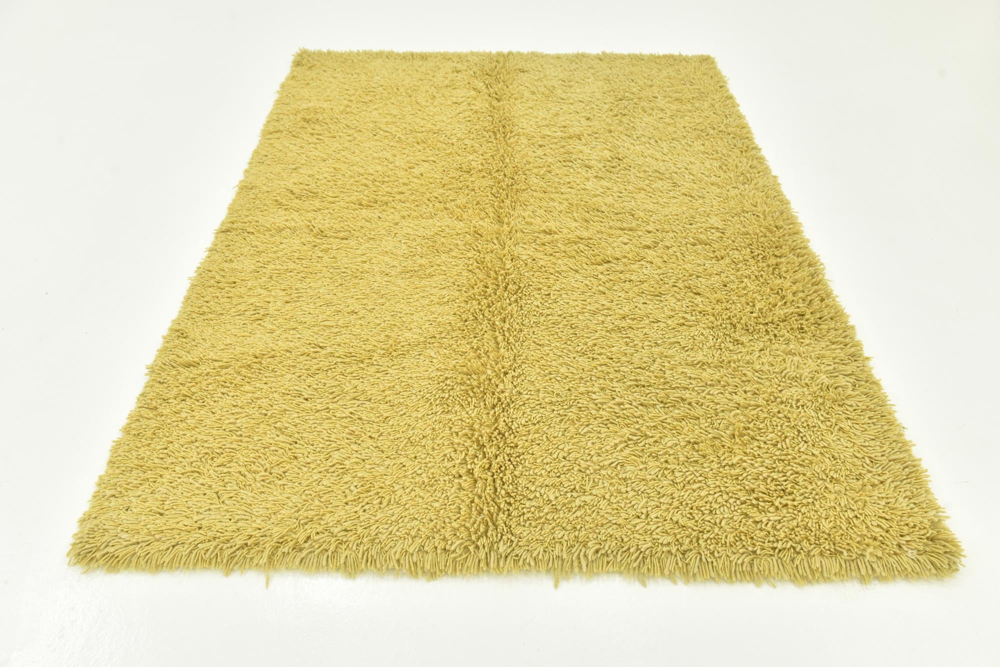 5' 8 x 7' 6 Hand Knotted Solid Shag Rug