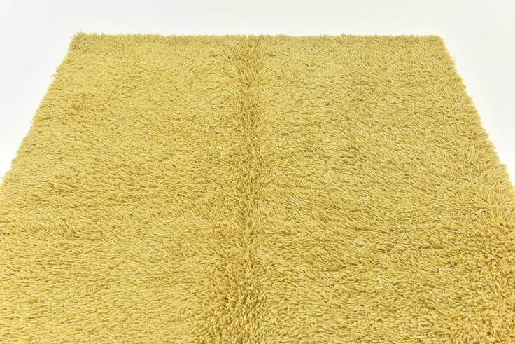 Detail image of 5' 8 x 7' 6 Hand Knotted Solid Shag Rug