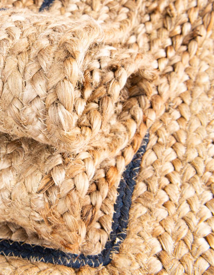 Detail image of 6' 1 x 9'  Hand Braided Jute Rug