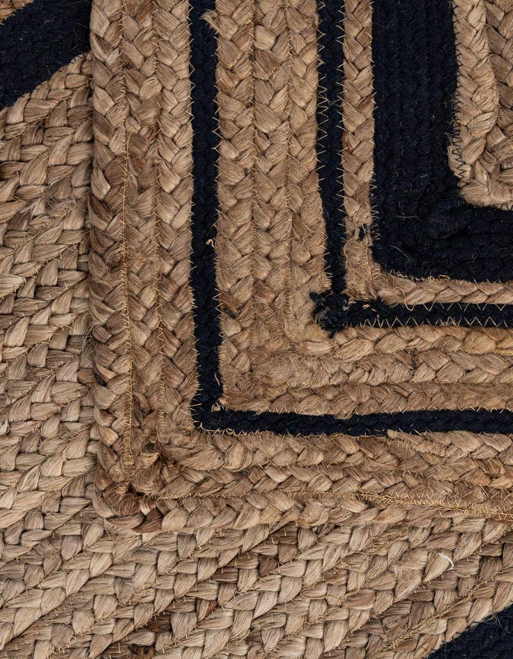 Detail image of 2' 6 x 4' 11  Hand Braided Jute Runner Rug