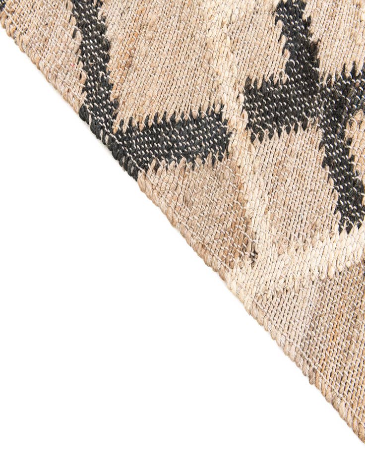 Detail image of 2' 1 x 3'  Hand Braided Jute Rug