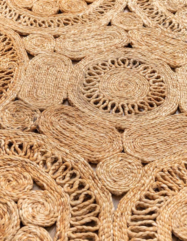 4' 1 x 4' 1 Handmade Braided Jute Round Rug