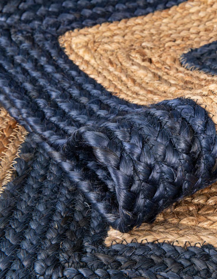 Detail image of 4' 1 x 6' 1  Hand Braided Jute Rug