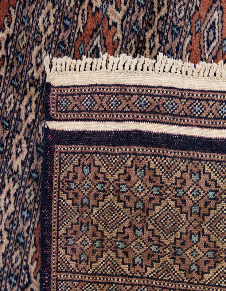 Detail image of 4' 1 x 5' 8  Hand Knotted Bokhara Oriental Wool Rug