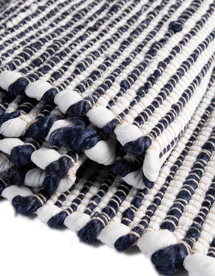 Detail image of 4' 1 x 6' 1 Hand Woven Chindi Jute Rug