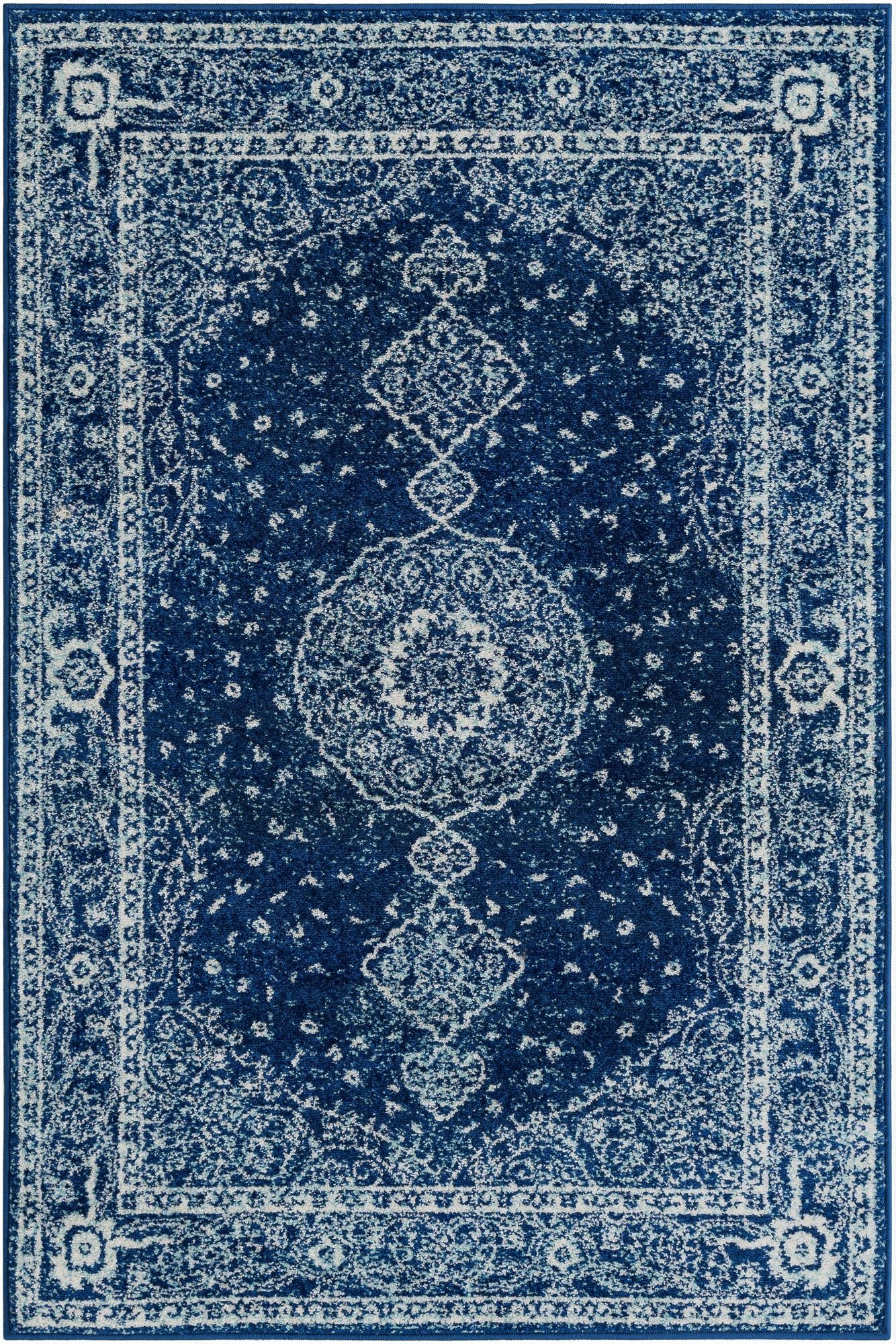 A 4x6 rectangular navy blue and white shabby-chic rug with a distressed medallion pattern, ideal for a living room.