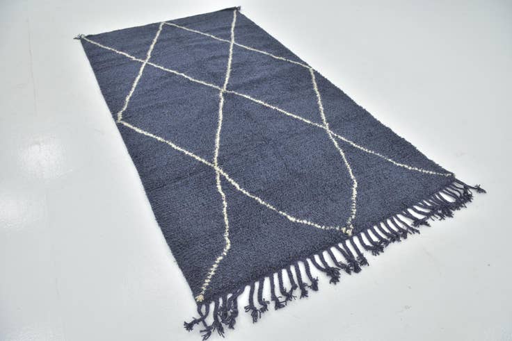 Detail image of 4' 8 x 8' 6 Hand Knotted Moroccan Wool Rug