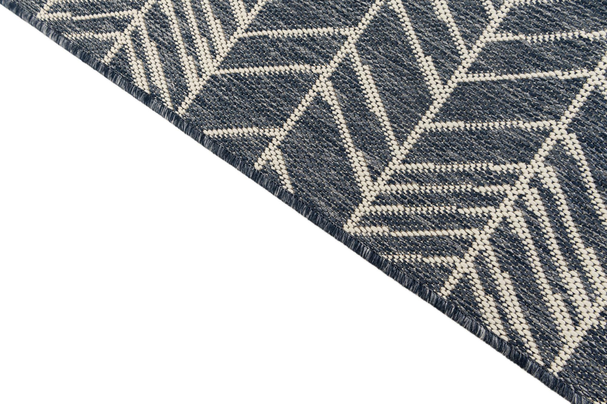 5' 3 x 7' 8 Easy-Clean Modern Indoor / Outdoor Rug