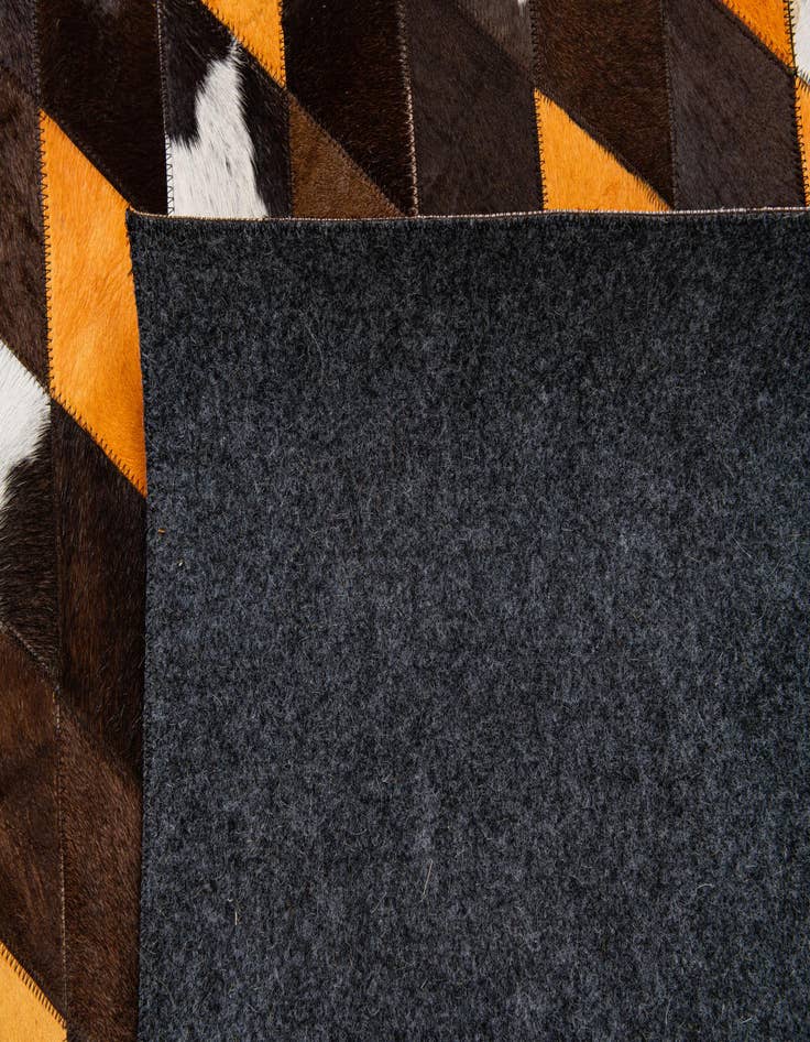 Detail image of 5' x 7' 11 Cowhide Stocks Rug
