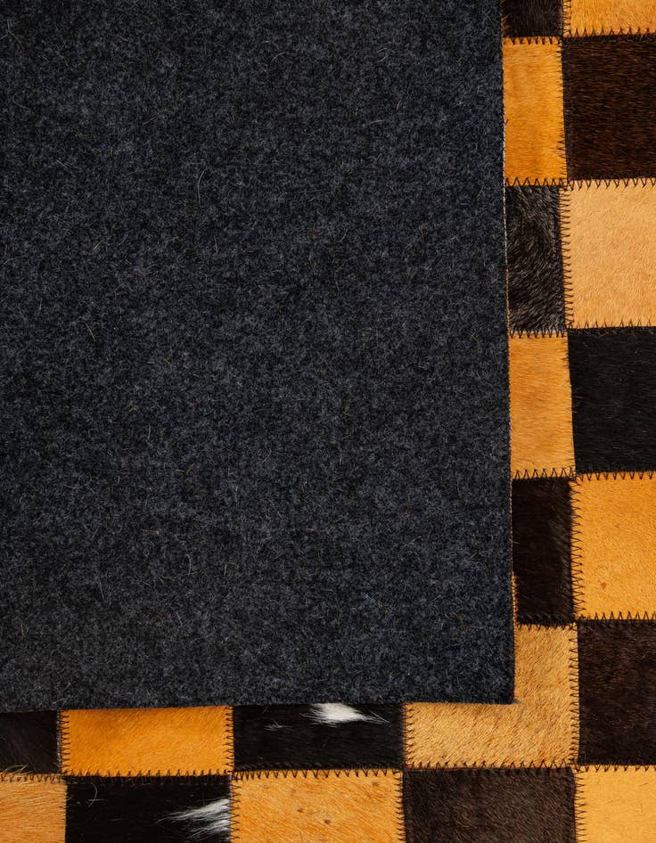 Detail image of 5' 2 x 8' 1 Cowhide - Patchwork Rug