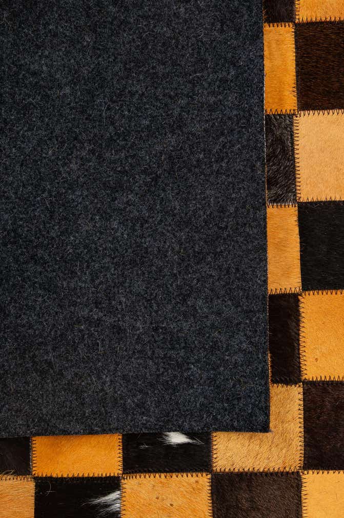 5' 2 x 8' 1 Cowhide - Patchwork Rug