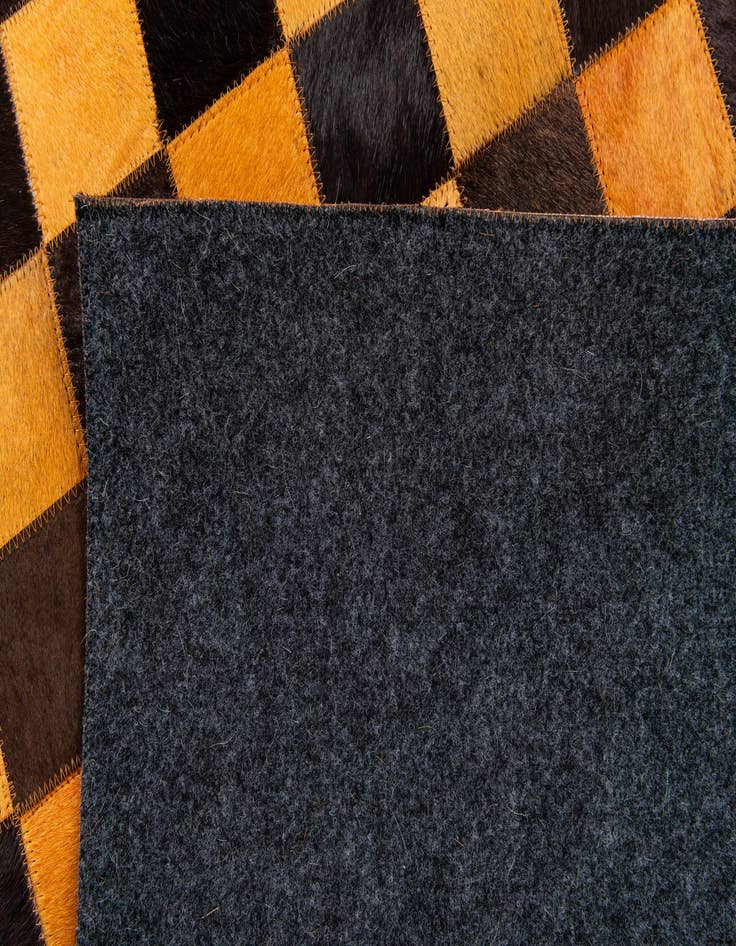 Detail image of 5' 2 x 8' Cowhide Stocks Rug