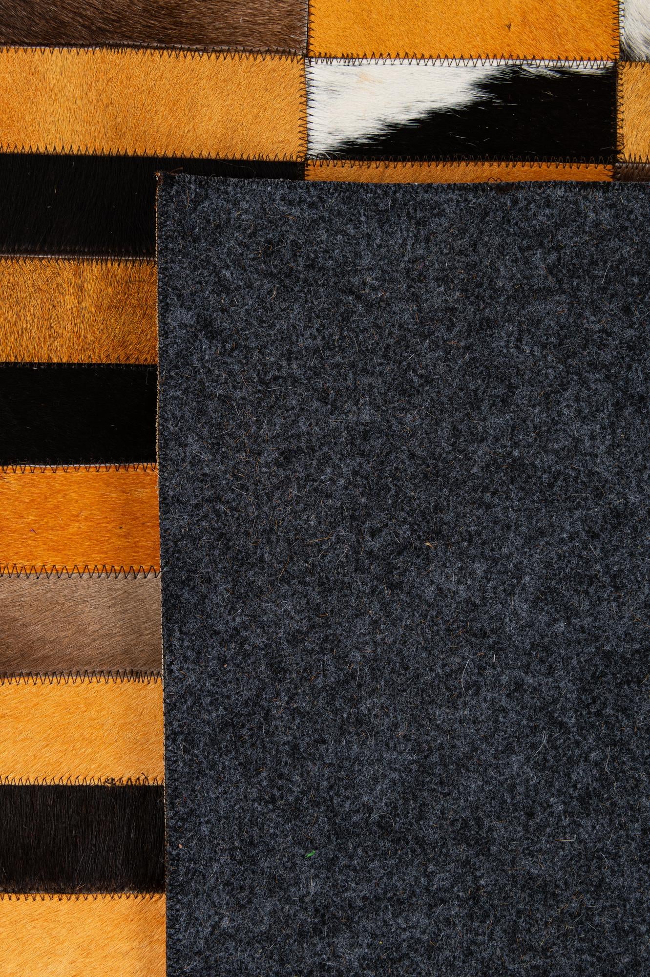 8' 1 x 9' 11 Cowhide - Patchwork Rug