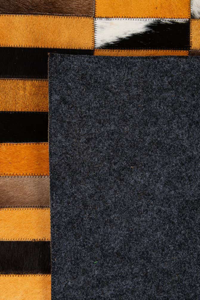 8' 1 x 9' 11 Cowhide - Patchwork Rug