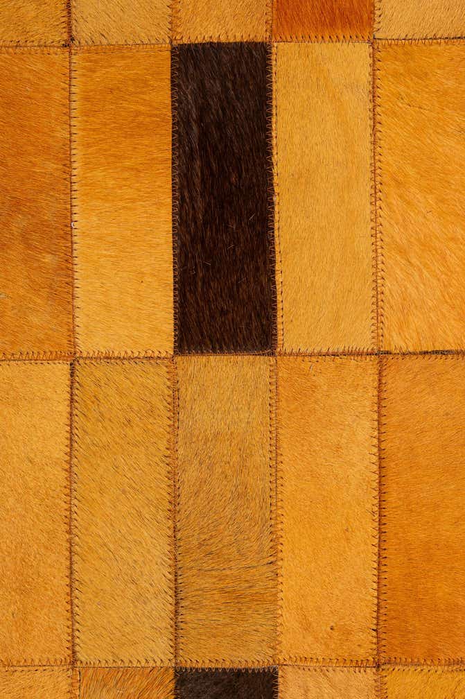 5' 1 x 7' 10 Cowhide - Patchwork Rug