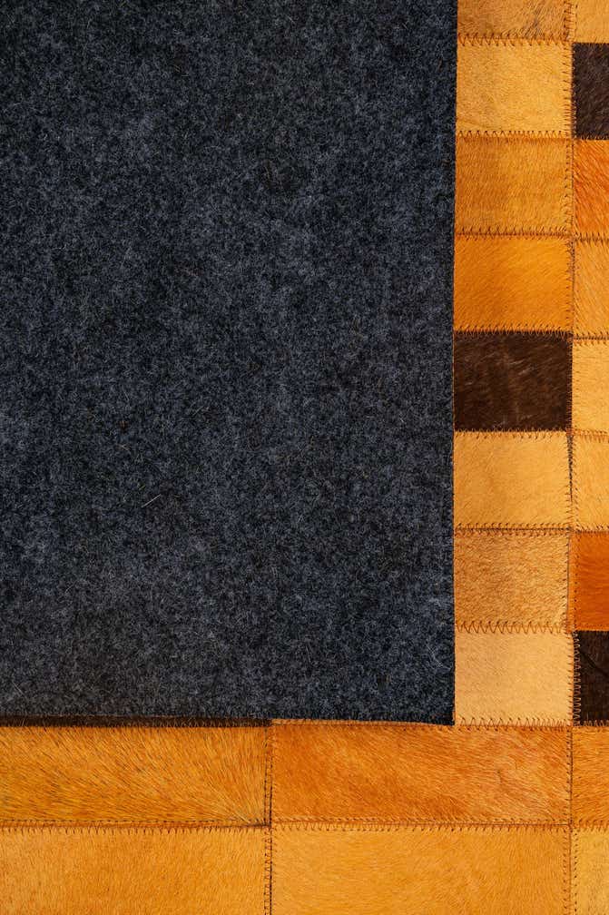 5' 1 x 7' 10 Cowhide - Patchwork Rug