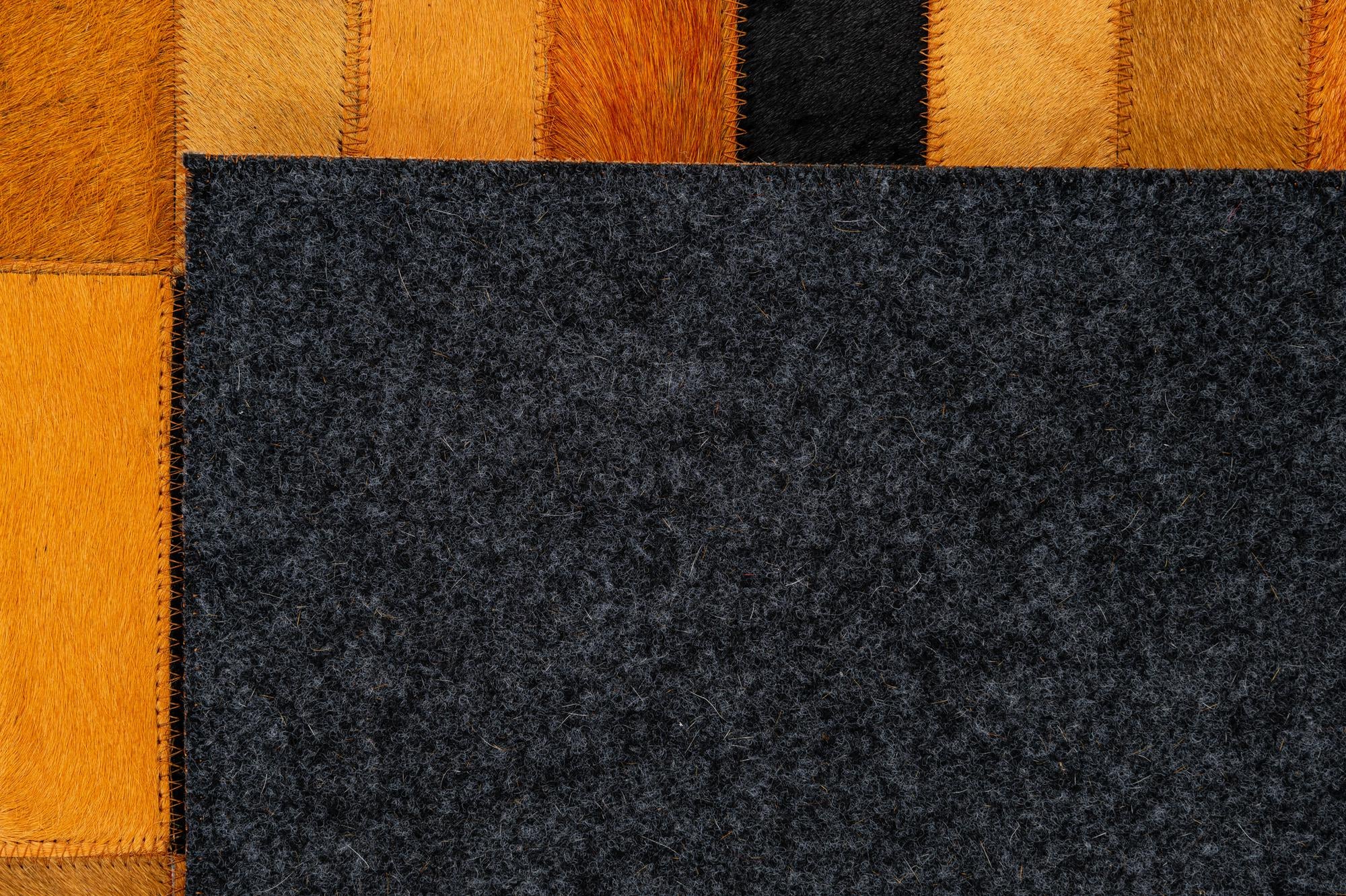 4' 11 x 8' 1 Cowhide - Patchwork Rug