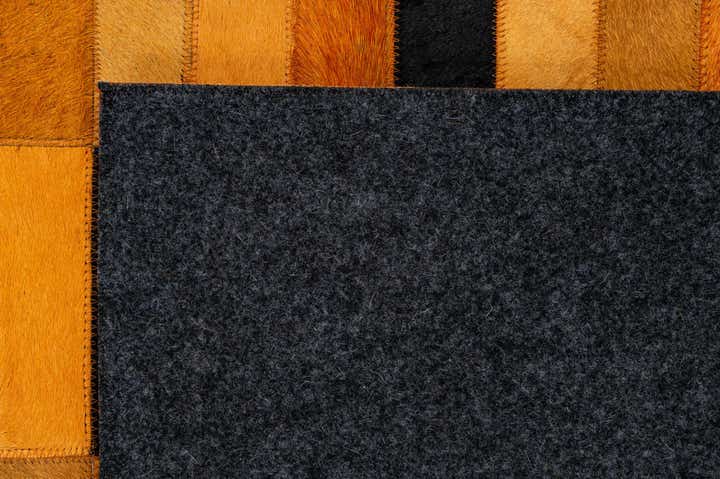 4' 11 x 8' 1 Cowhide - Patchwork Rug