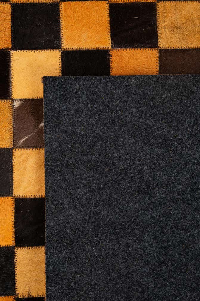 5' 2 x 8' 1 Cowhide - Patchwork Rug