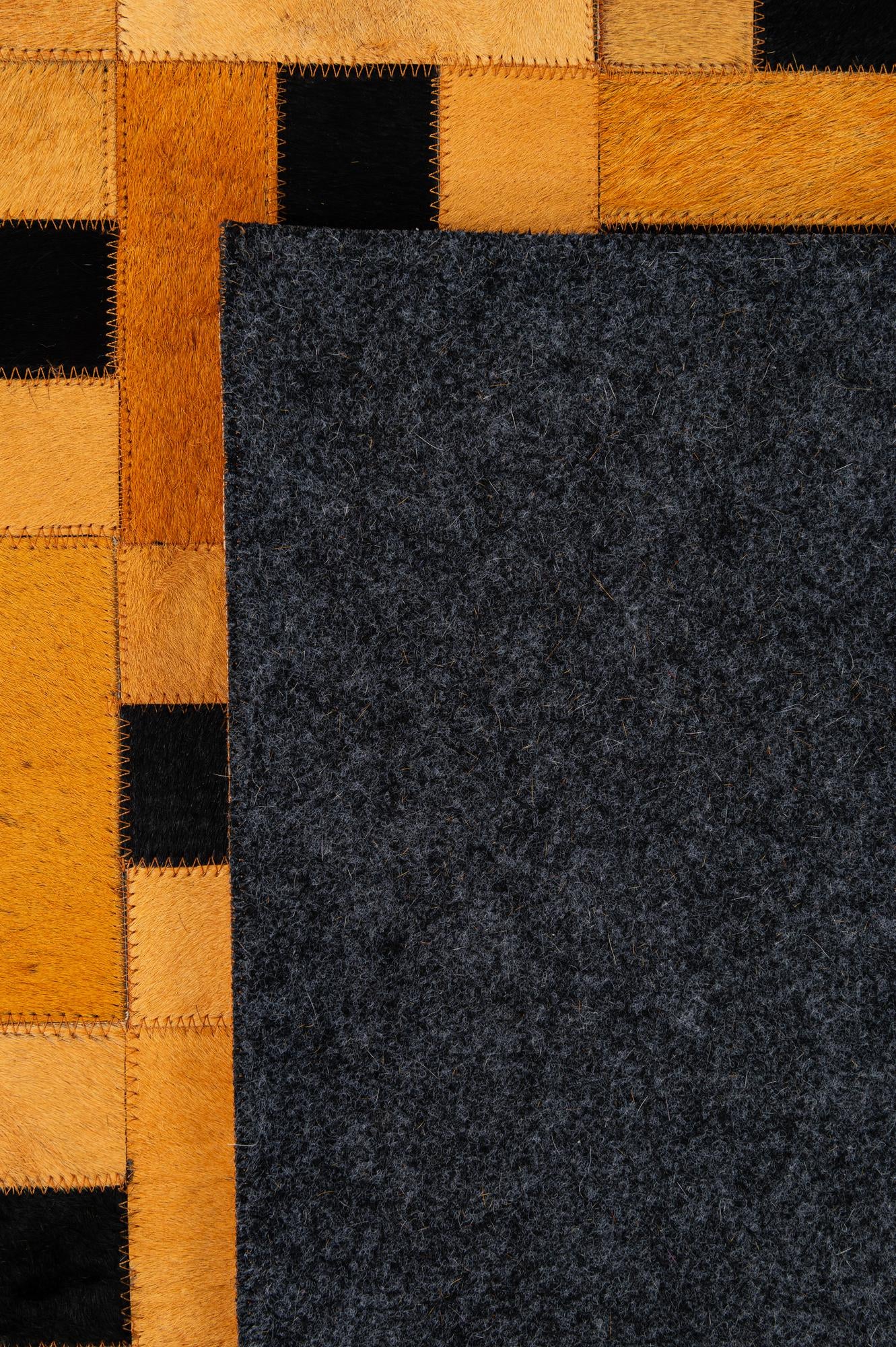 5' 2 x 8' 1 Cowhide - Patchwork Rug