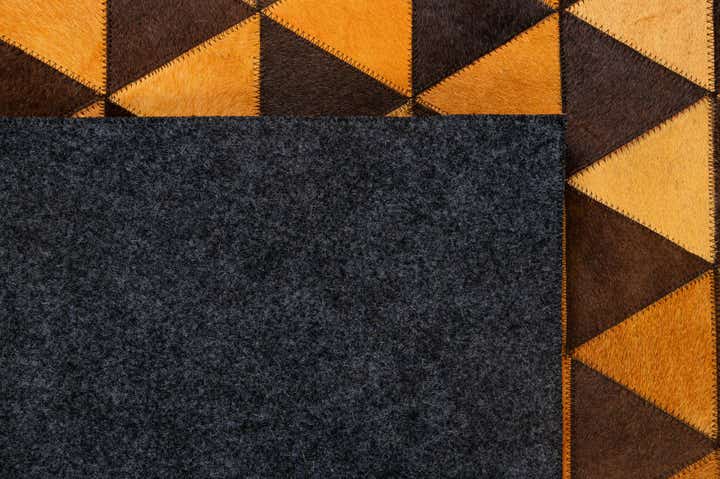 5' 3 x 8' 1 Cowhide - Patchwork Rug