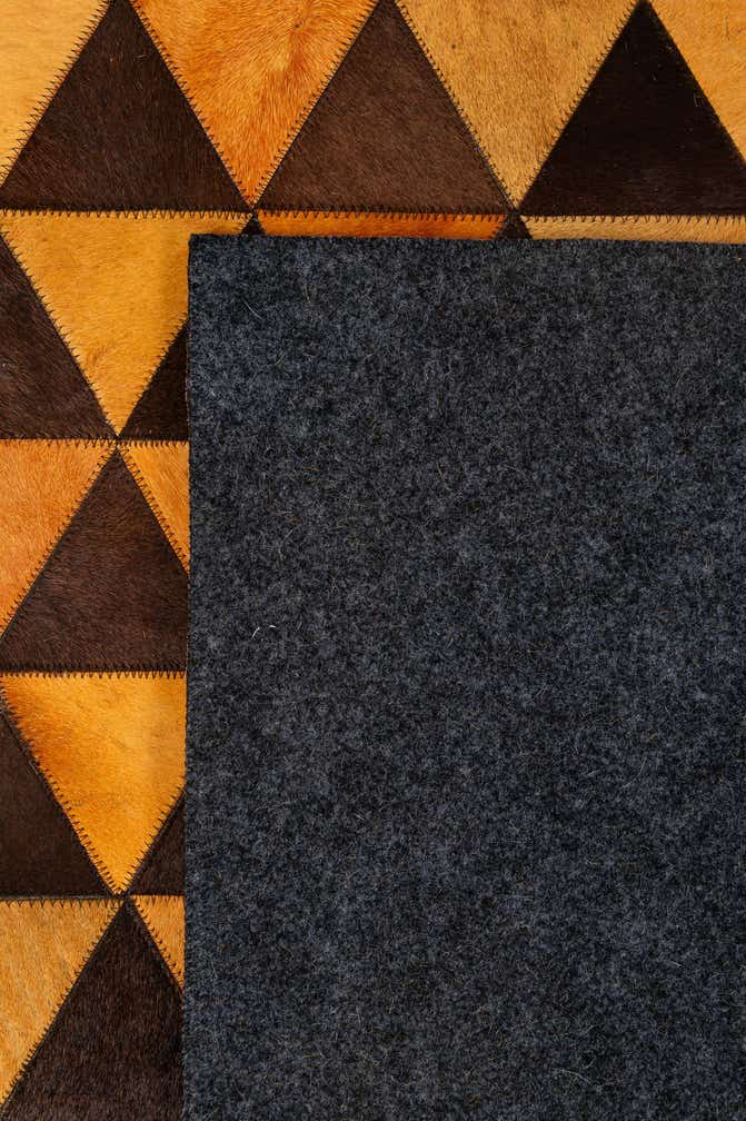 5' 3 x 8' 1 Cowhide - Patchwork Rug