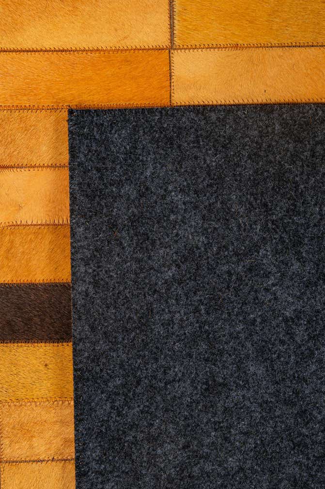 5' 1 x 7' 11 Cowhide - Patchwork Rug